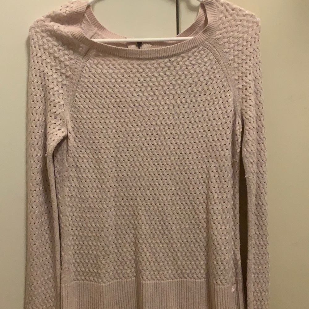 Light pink sweater.